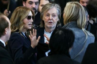 Paul McCartney, pictured here in Paris earlier this month, said he wondered if he was just writing about the past -- but 'then I think how can you write about anything else?'