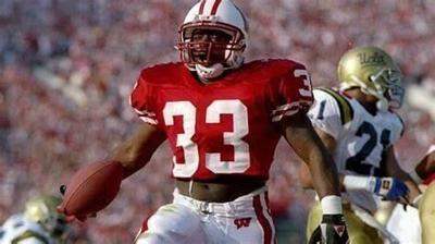 Brent Moss (file photo) pictured in the 1994 Rose Bowl win with the Wisconsin Badgers.