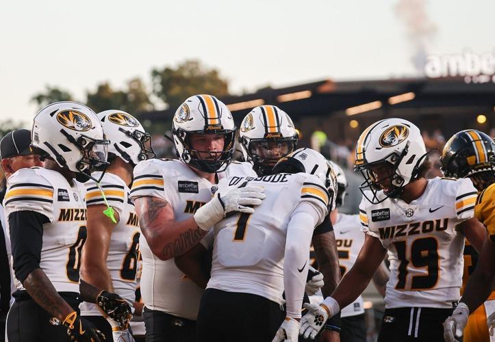 Mizzou players celebrate after Mizzou wide receiver Donovan Olugbode (1) scores a touchdown (copy)