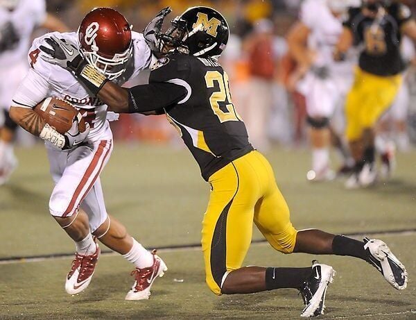 Kevin Rutland attempts to take down Kenny Stills (copy)