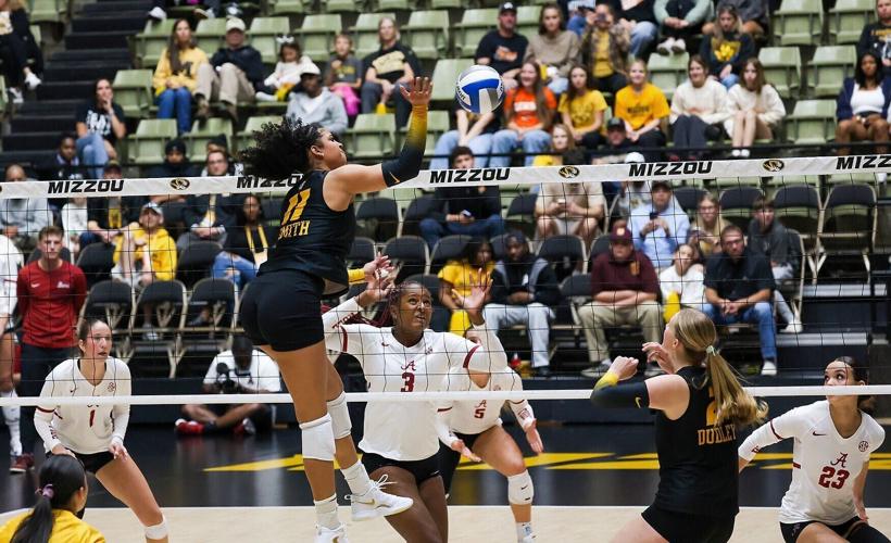Mizzou freshman Eva Smith spikes the ball