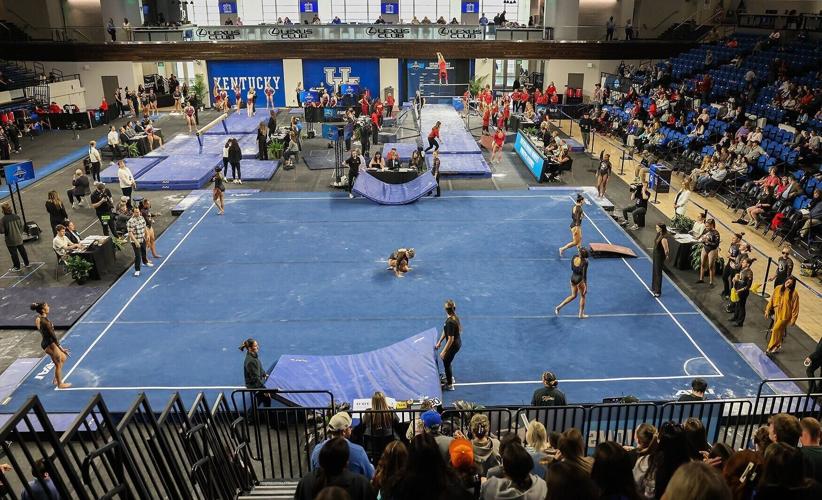 The Tigers warm up for their floor routines