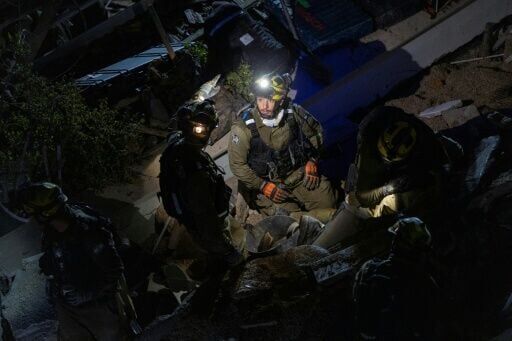 The Israeli military and medics said a missile fired from Iran hit a residential building in the northern city of Haifa