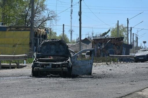 AFP journalists in Merefa saw several bodies strewn in the street