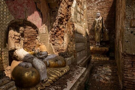 Earthquake-damaged Buddha statues are seen at Shwe Ku Gyi Pagoda in Mandalay