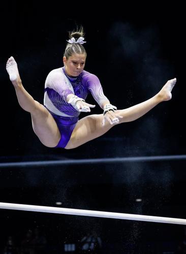 LSU’s Ashley Cowan performs in her uneven bars routine