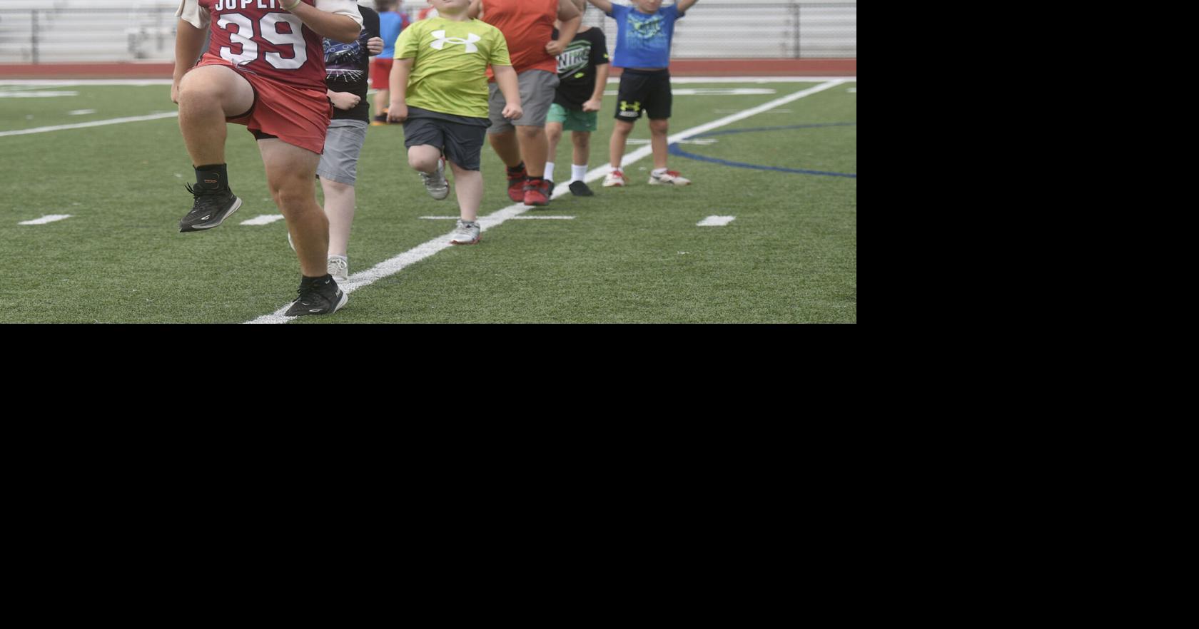 Area kids grow love of game at JHS grid iron camp