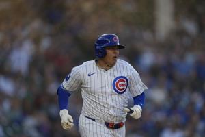 Cubs put Ian Happ on IL with oblique strain and call up prospect Moises Ballesteros