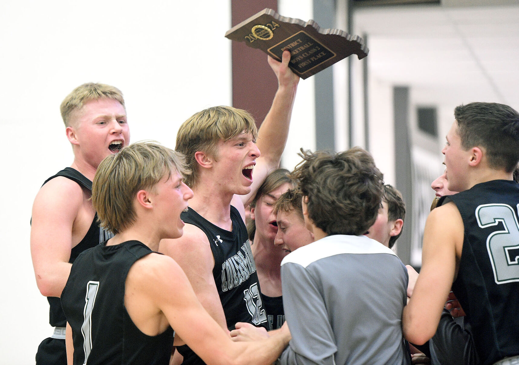 College Heights Christian School Claims Class 2 District 12 Boys Basketball Championship in Thrilling Victory Over Ash Grove