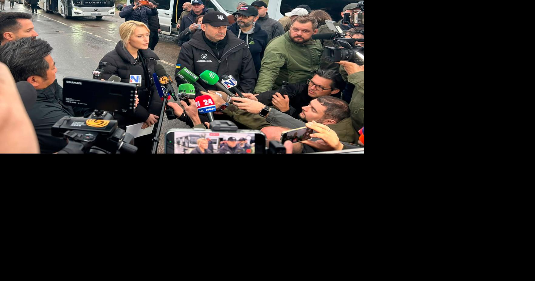 Evacuees reunite with family at the Ukrainian-Belarusian border after fleeing Oleshky