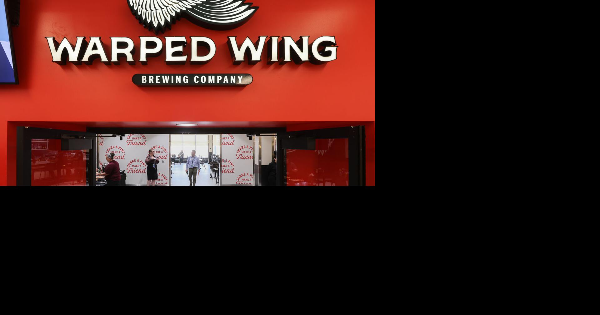 Warped Wing brings Dayton taproom vibe to airport visitors