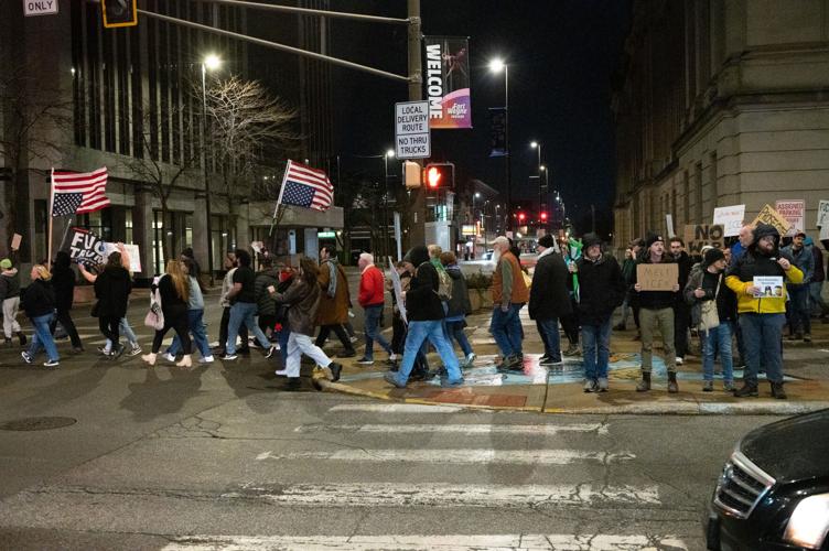 Fort Wayne protesters march against ICE after deadly shooting in ...