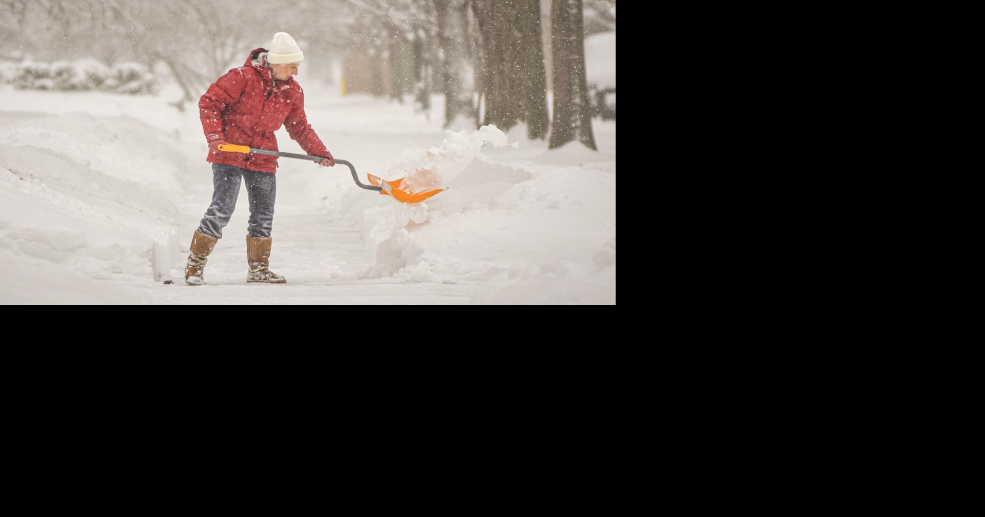 Storm blankets area, prompts cancellations, travel cautions due to drifts continue