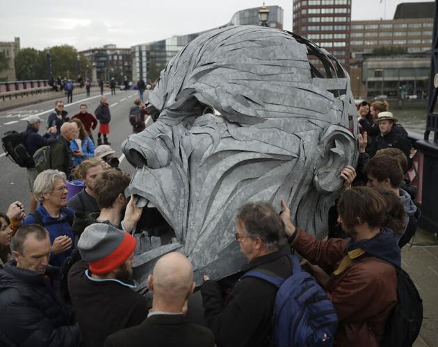 Climate activists block roads, march in global protests | World News ...