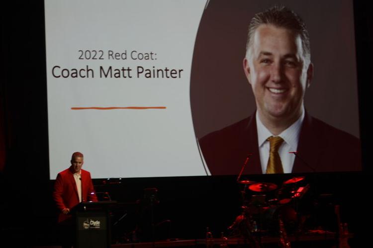 Painter honored with Red Coat