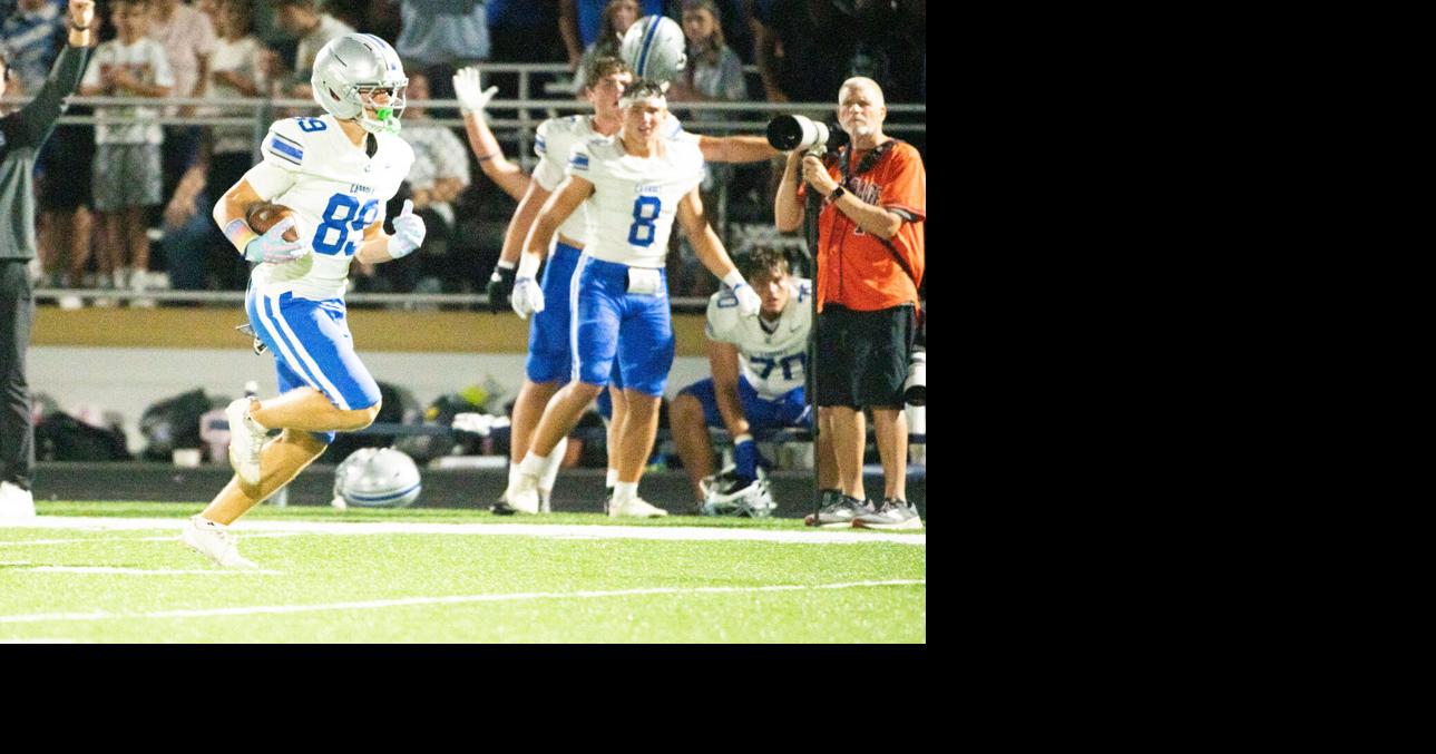 Carroll breaks through the Bishop Dwenger defense, takes edge in SAC race
