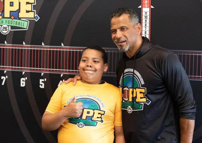 Young football fans flock to Rod Woodson's camp High Schools