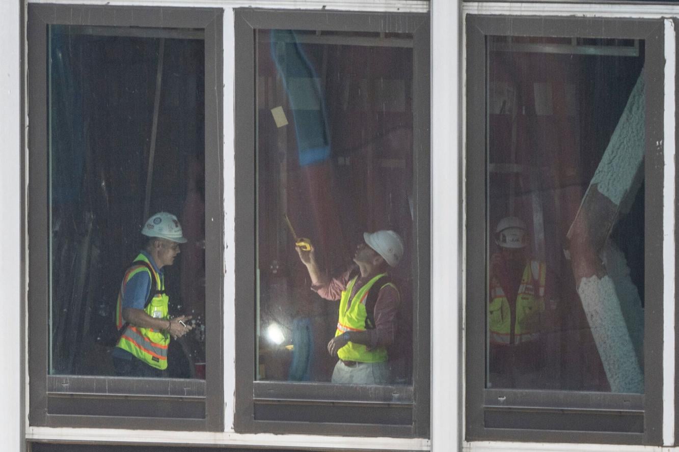 Evacuated residents and hotel guests are allowed to return amid work on ...