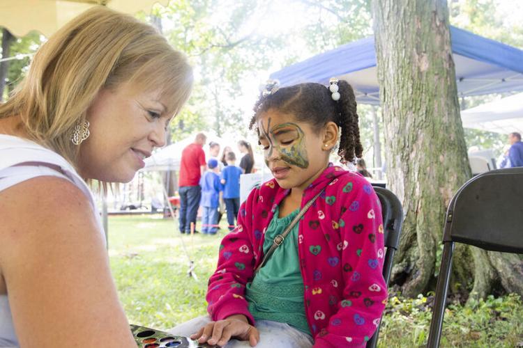 Waynedale neighbors don rain gear but still enjoy annual picnic Local