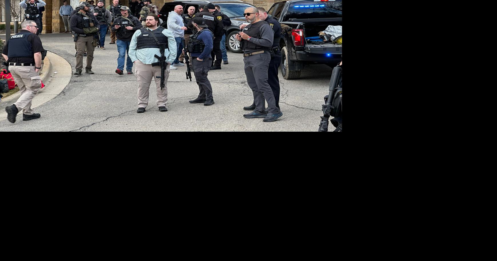 Armed man rammed vehicle into Michigan synagogue; fatally shot by security, AP source says