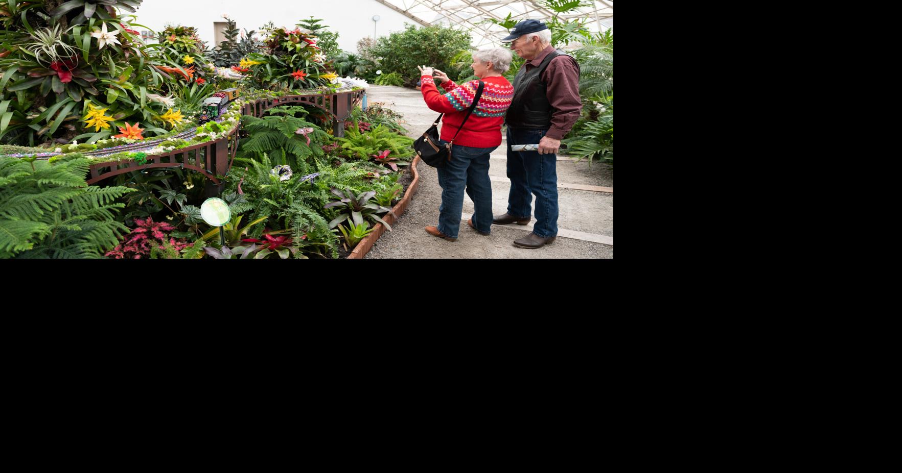 Catching a model train at the Foellinger-Freimann Botanical Conservatory