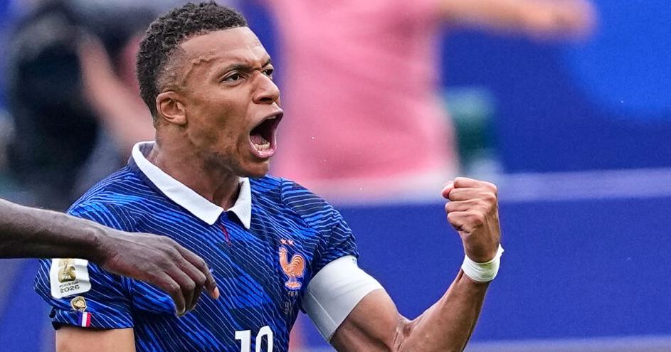 Mbappé scores 2 goals to lead France over Iraq and into World Cup knockout stage