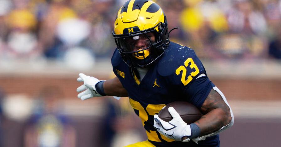 Michigan takes advantage of Washington turnovers, pulls away to win