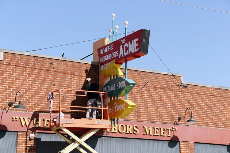 Acme sign spruced up Local