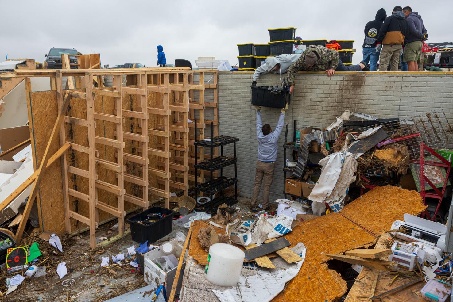 Photos and video: Nebraskans pick up the pieces day after Howard County ...