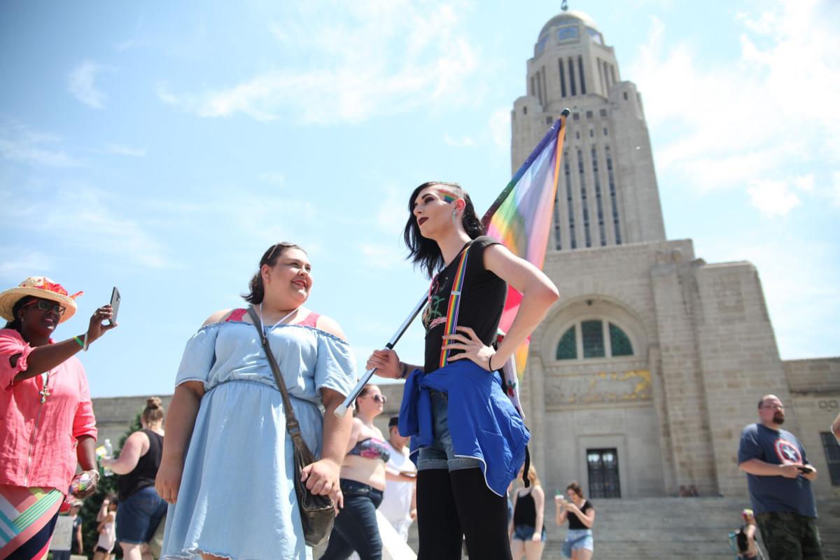 Hundreds march to celebrate LGBT community and call for better