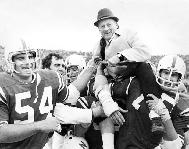 Bob Devaney being carried off the field after  win over OK in 1