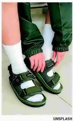Do socks belong with sandals?