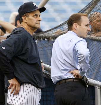 New York Yankees' manager Joe Torre watches batting practice before the  final game of the American League championship series against the Boston  Red Sox at Yankee Stadium on October 20, 2004 in