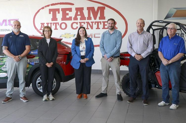 Top United Way Duck Draw winners collect grand prizes at Team Auto