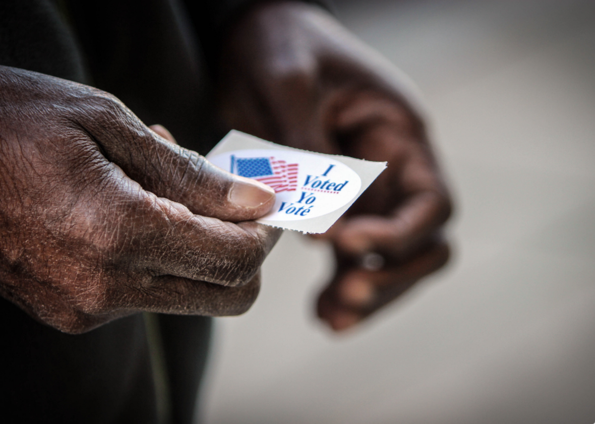 Question #55: What are two ways that Americans can participate in their democracy?
