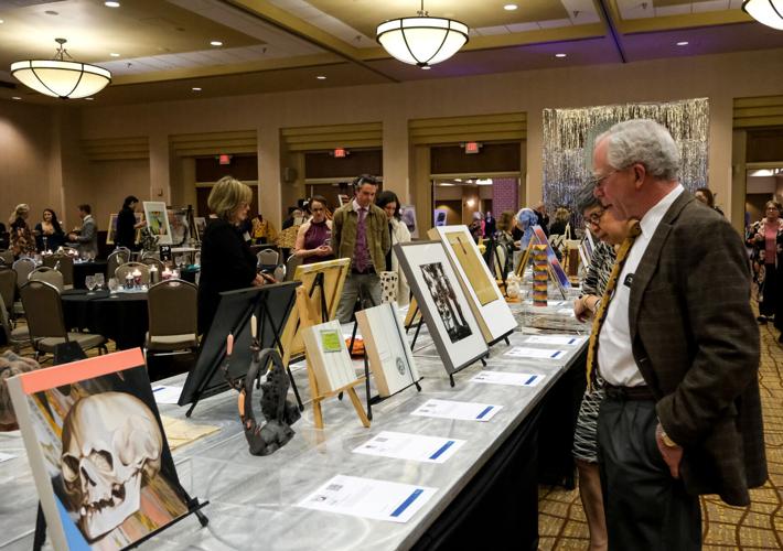 Frederik and Rosemary Ohles at silent auction