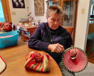 Volunteer knits hundreds of hats for St. Leo's annual coat drive in Grand Island