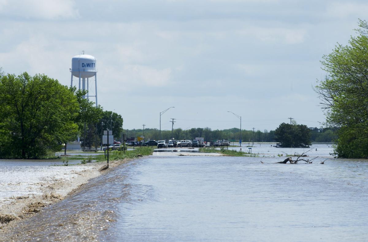 Dams have helped, but DeWitt residents always watching the water