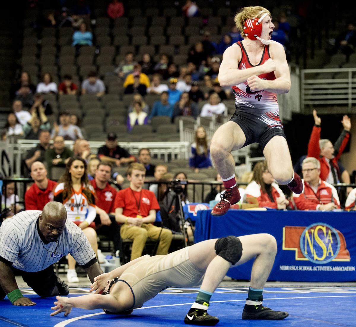 State wrestling tourney insider Hughes grabs third title, aims for