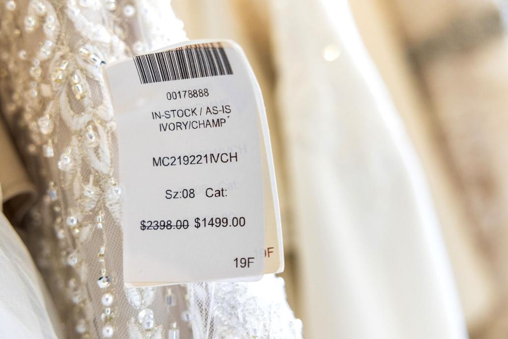 Former Tip Top Tux store reopens to sell leftover dresses