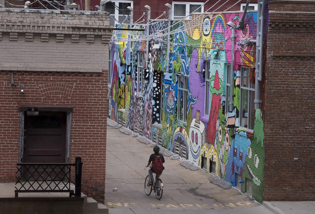 With Alley Length Mural Archrival Makes Wall A Go To Photo