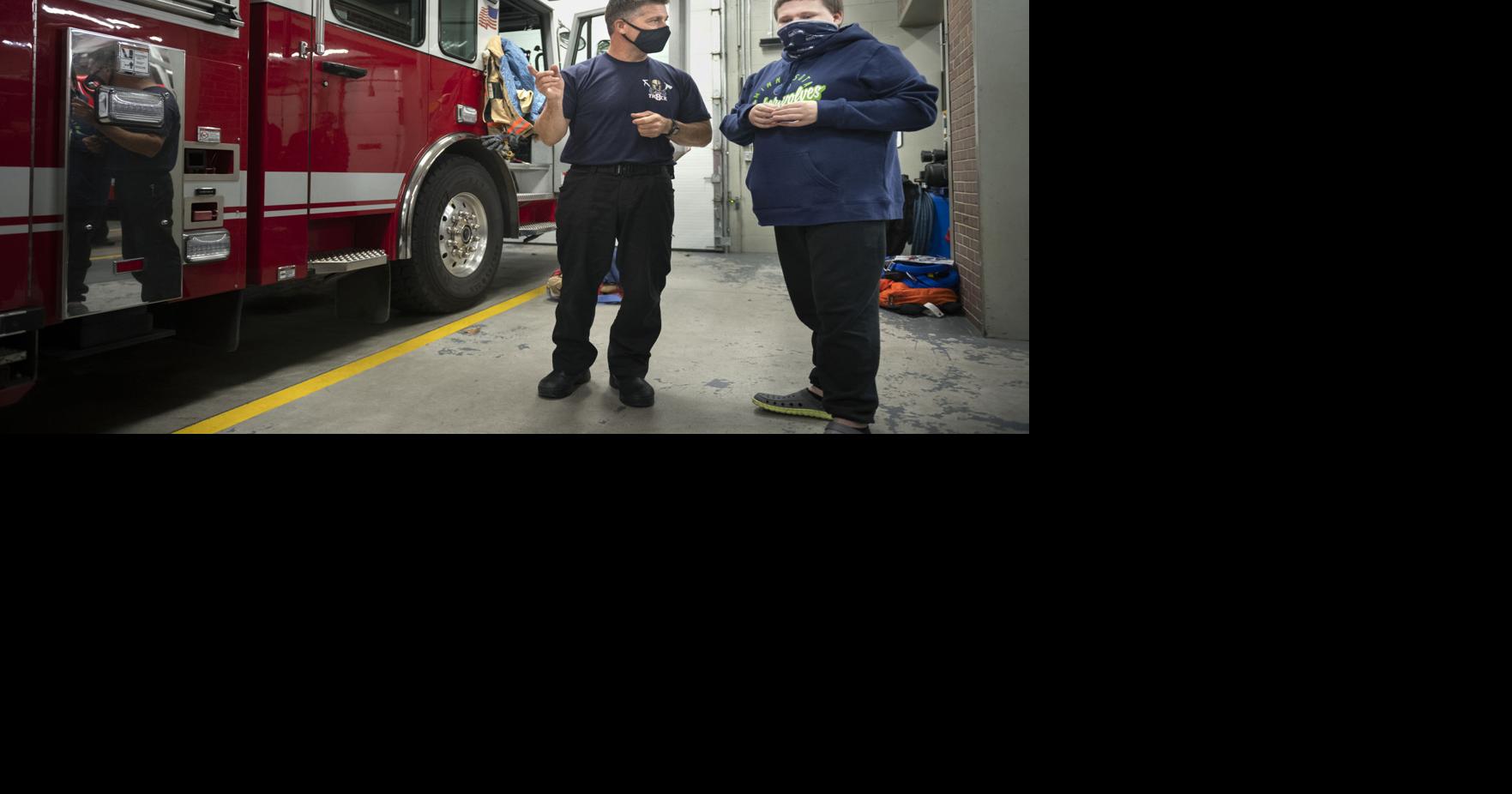 Lincoln family reunites with fire crew weeks after escape from smoky ...