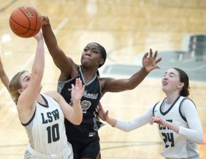 Lincoln Northeast’s Doneelah Washington leads Class A in points, rebounds, blocks, but has another goal in mind