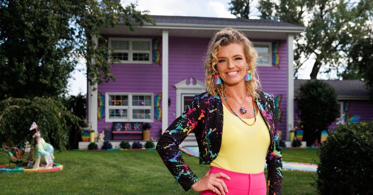 Why be boring? Her house is purple outside and a rainbow wonderland inside.