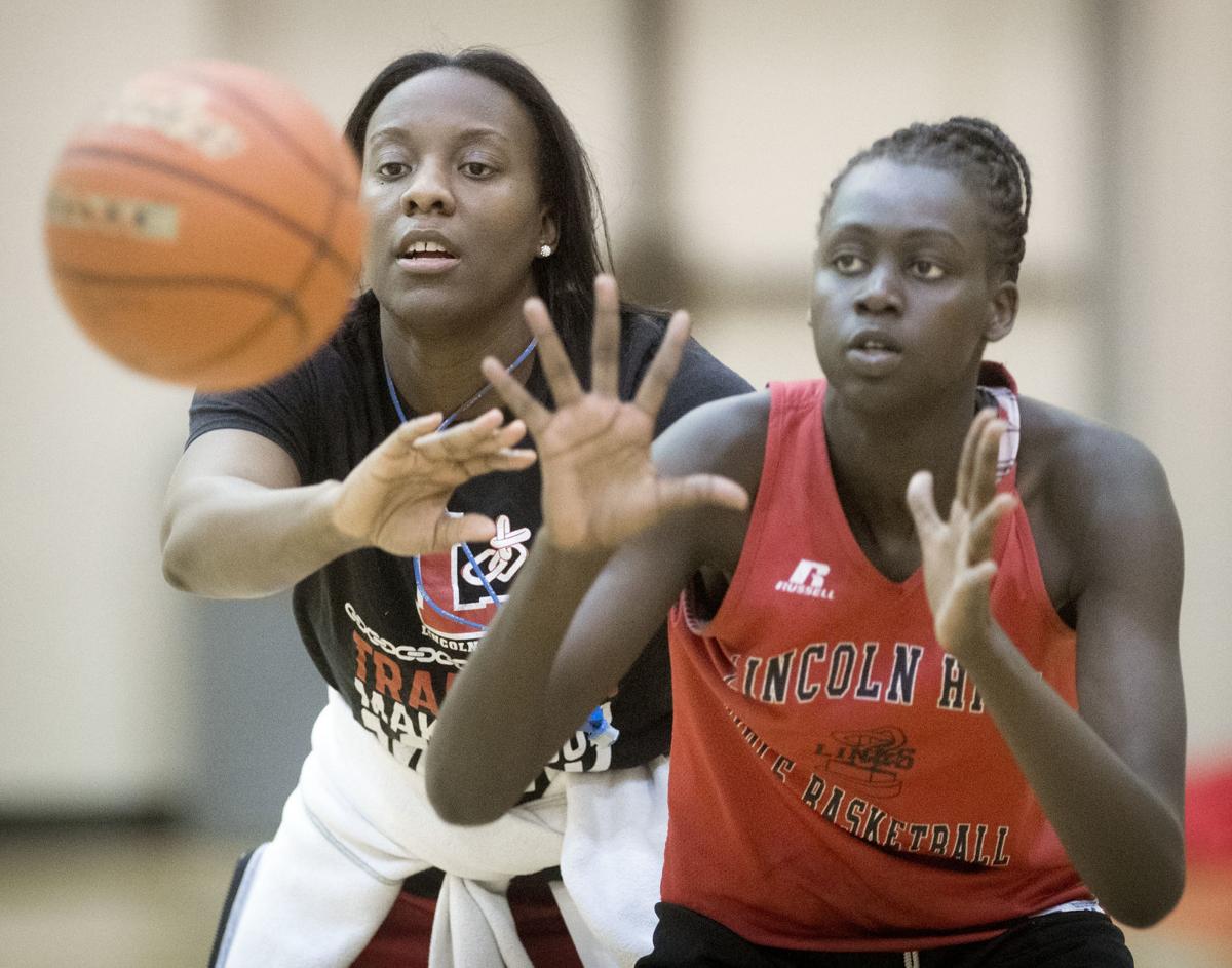 Dominique Kelley Johnson Getting An Assist From Her Former Coach