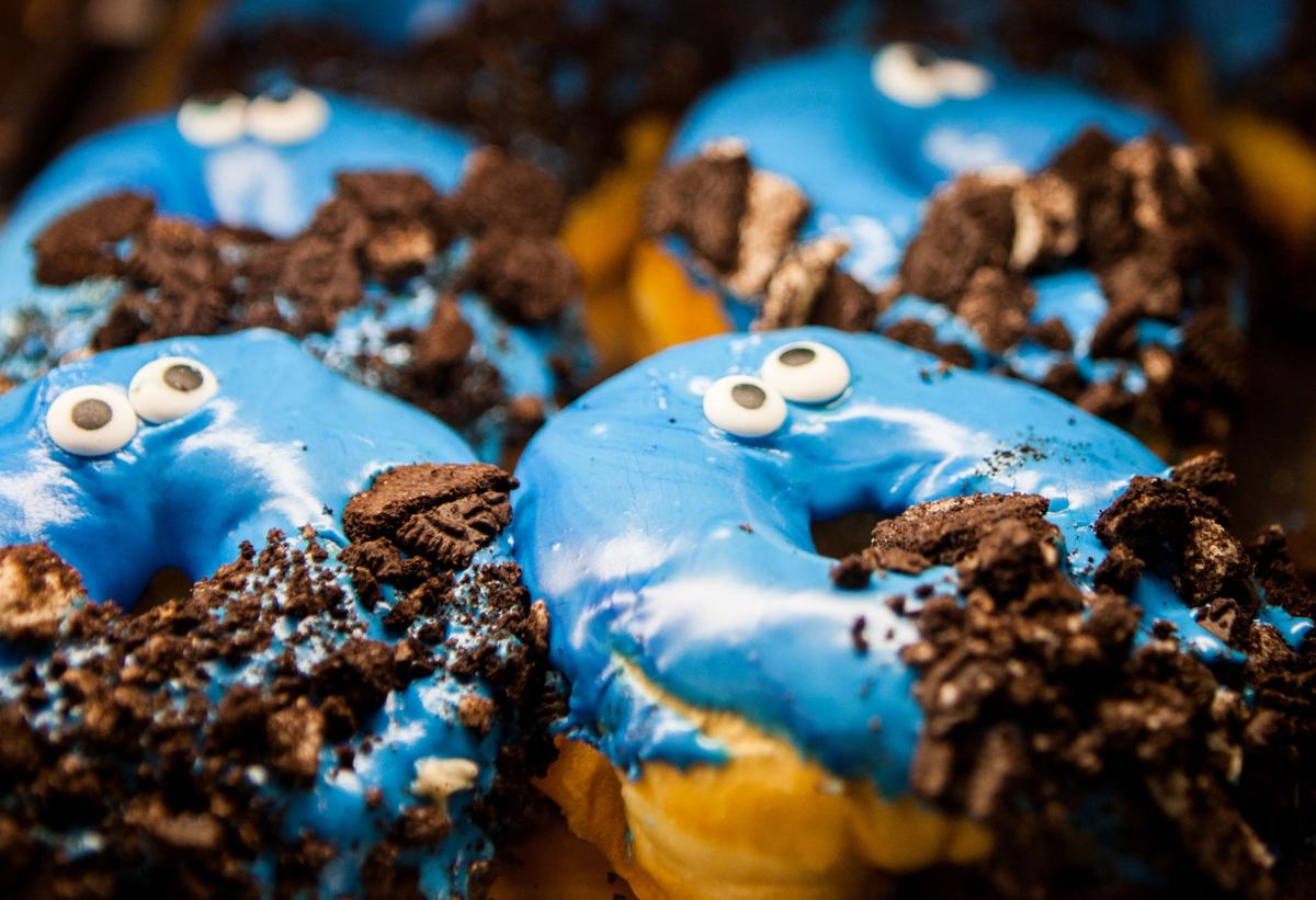 Hurts Donuts attracts hundreds, even on a wet and chilly morning