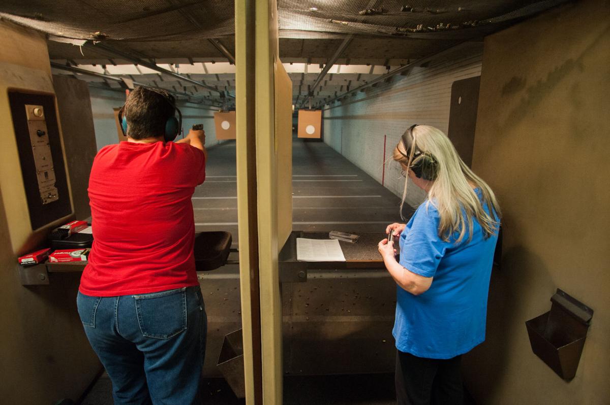 Women, guns Well armed and growing Local
