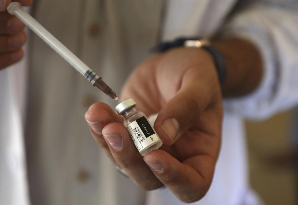Virus Outbreak WHO Vaccine Boosters