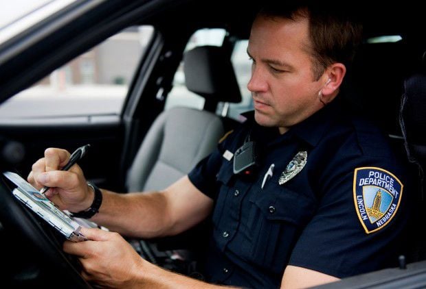 Report writing police officer image