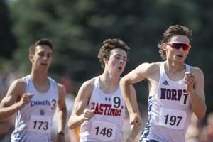 State track: Riley Boonstra stars, Norris boys win first team title; Thomas powers Titan girls